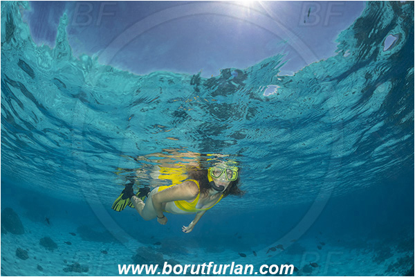 French Polynesia, Tuamotu Archipelago, Fakarava atoll, Pacific ocean, Snorkeling, Breath-hold diving, Apnea, Girl, Swimming suit